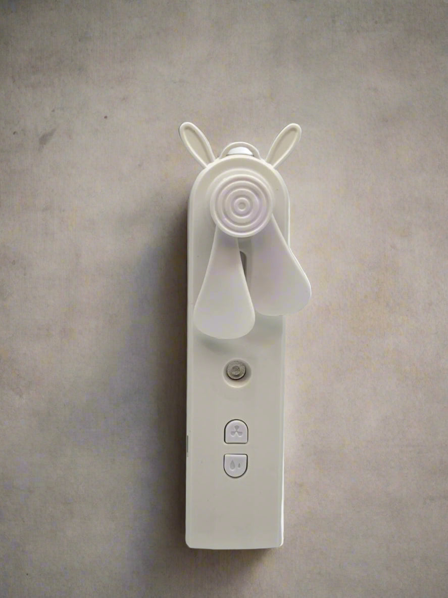 Mini Handheld Fan with Facial Mist Sprayer – Rechargeable & Portable